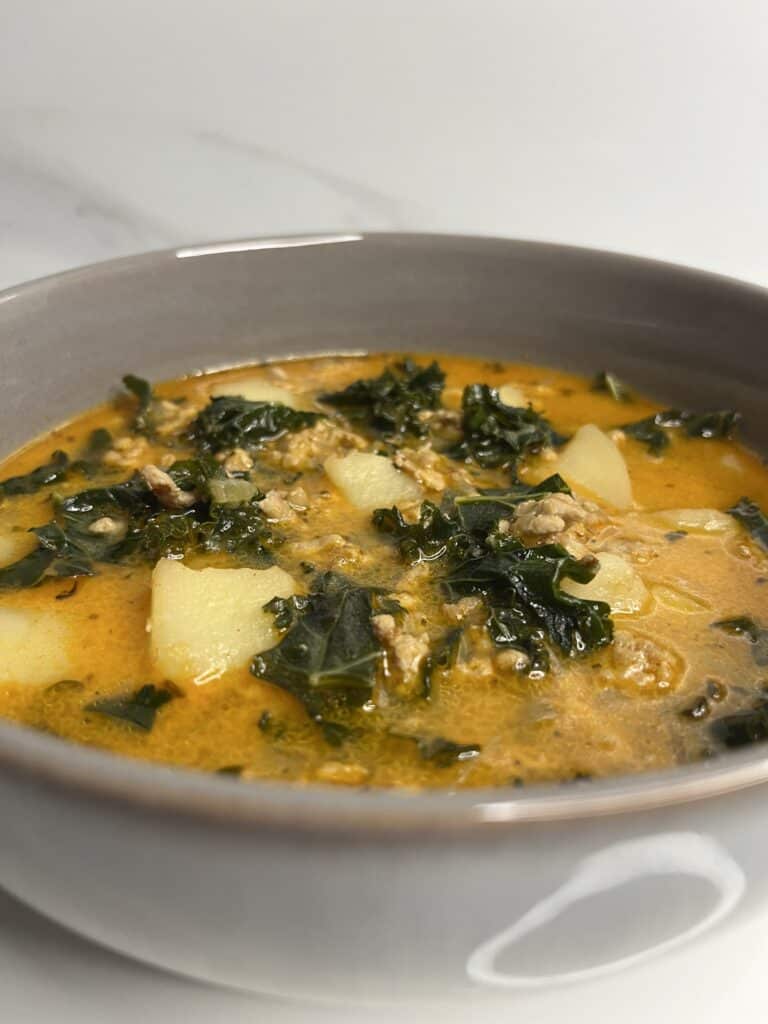 zuppa toscana, with pork mince, onion, potato, kale, chicken stock, and coconut cream