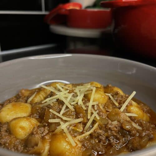 french onion gnocchi with a red wine tomato beef mince in a bowl