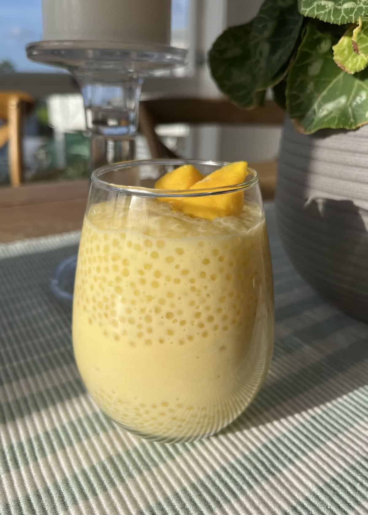 mango sago asian dessert in the sun, layered mango dessert mix and cooked sago pearls