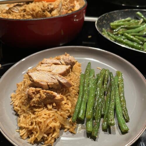 one pot chicken and rice, flavourful seasoned rice with chicken thighs on top, served with green beans