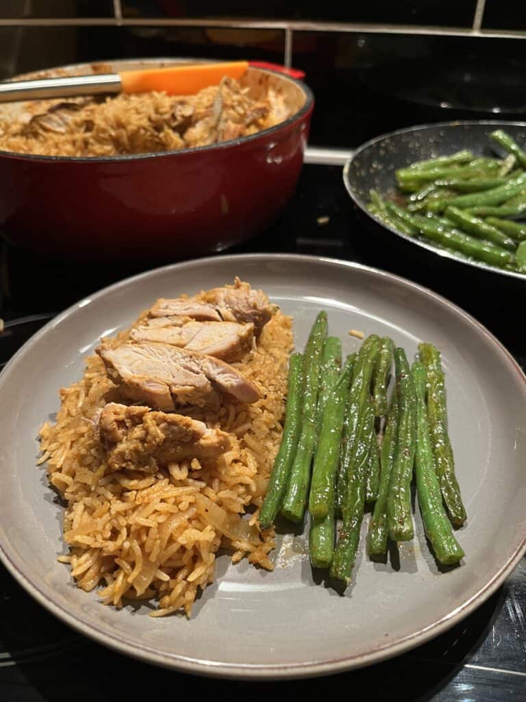 one pot chicken and rice, flavourful seasoned rice with chicken thighs on top, served with green beans