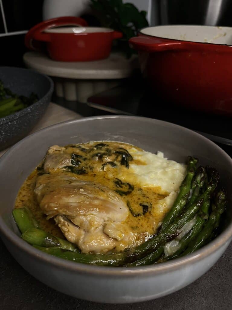 garlic parmesan chicken with cheesy mashed potatoes, chicken thighs, asparagus, and spinach