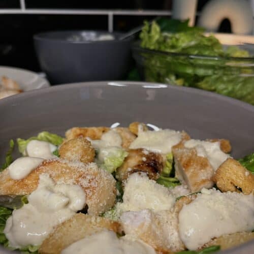 chicken caesar salad with homemade dressing and croutons