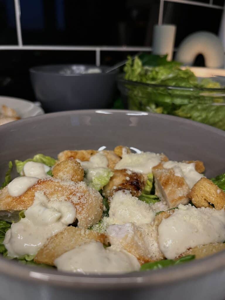 chicken caesar salad with homemade dressing and croutons