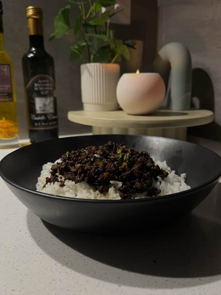 crispy beef mince, with soy sauce, oyster sauce, sesame oil, and spring onion served over white rice