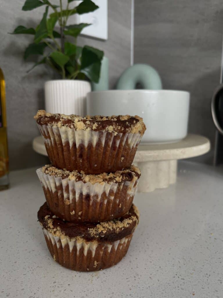 gluten free white chocolate raspberry muffins with an almond crumble topping