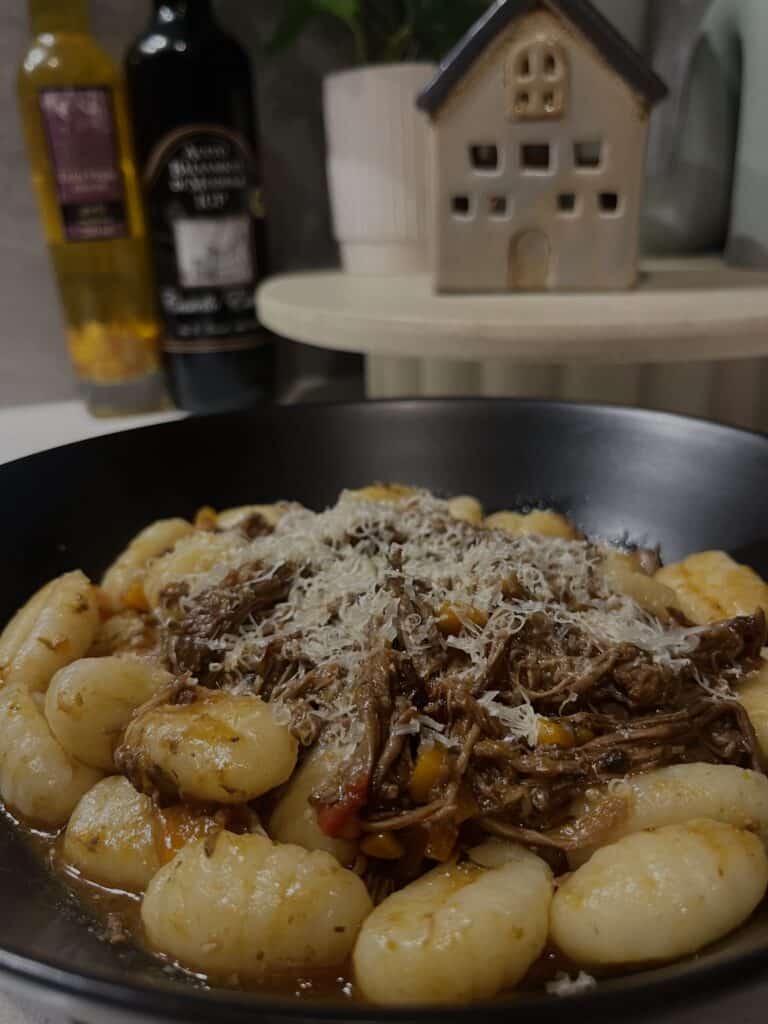 beef short rib slow cooked ragu in a tomato based sauce with gnocchi