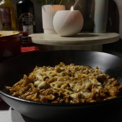 one pot lasagna with beef mince, cheese, tomato sauce, and pasta