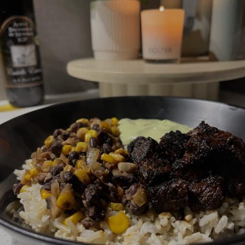 steak rice bowls with corn, black beans, mushrooms, brown rice, and seasoned charred steak